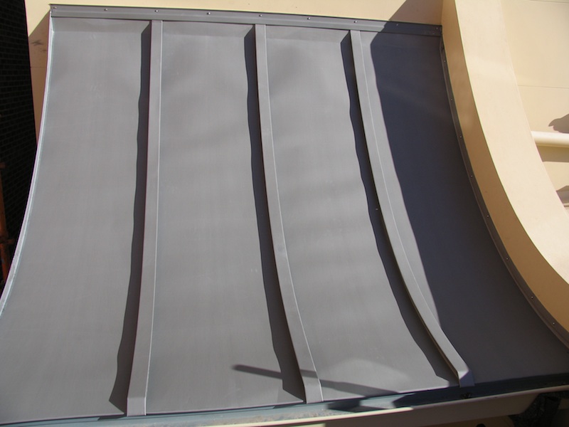 Zinc roofing Sydney-Traditional curved batten roll.Zinc roofing